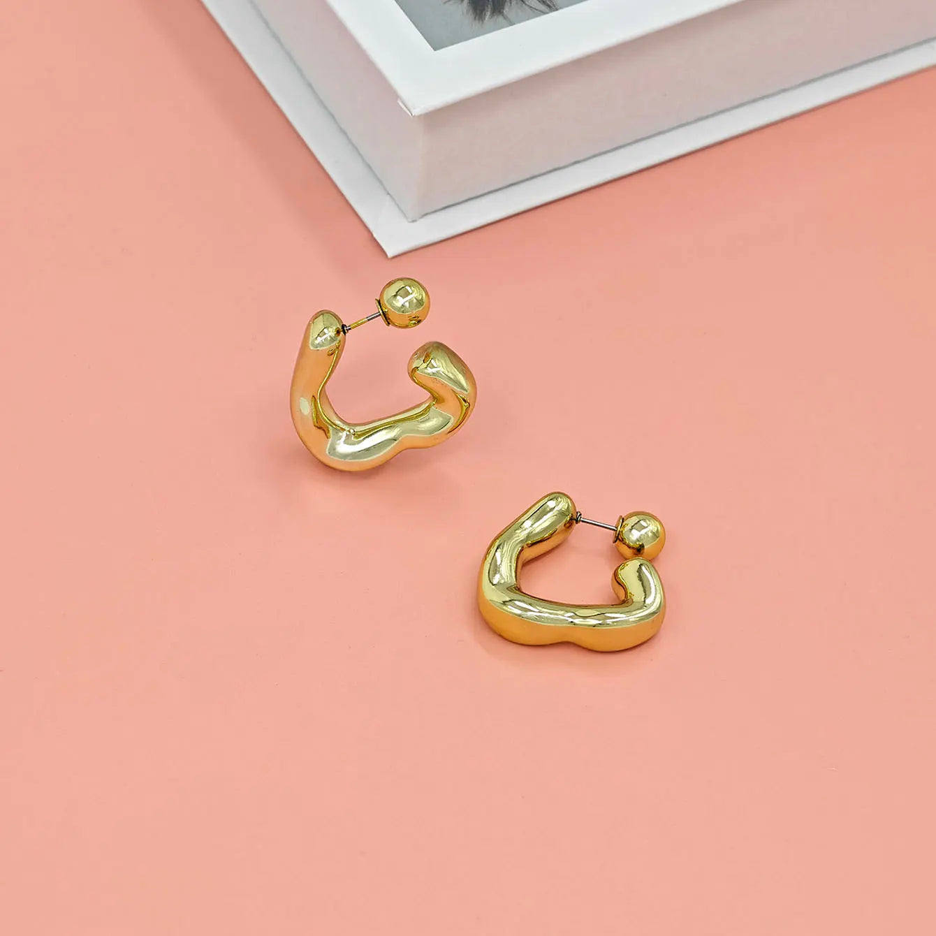 Fashionable C-Shaped Earrings with Unique Design