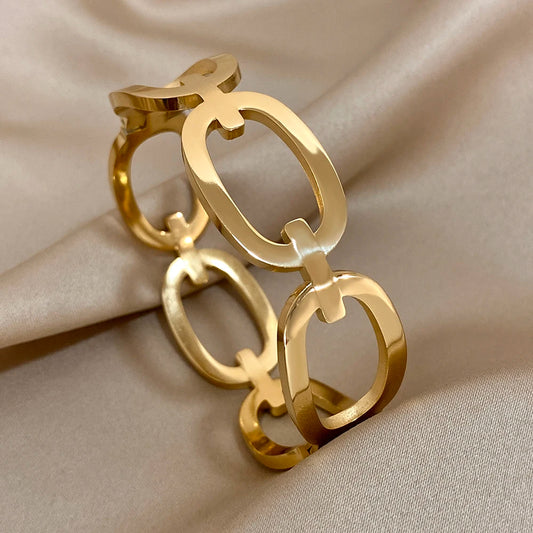 AENSOA Fashion Simple Hollow Out Interlock Cuff Bracelet